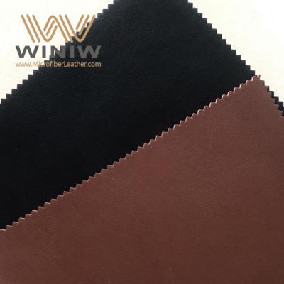 China Brown grabó en relieve la tela de la imitación de cuero para precio del mayorista de las correas el buen que vendía productos en venta