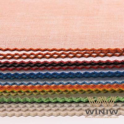 China Material de tejido de cuero de vinilo PU resistente al desgarro para bolas en venta