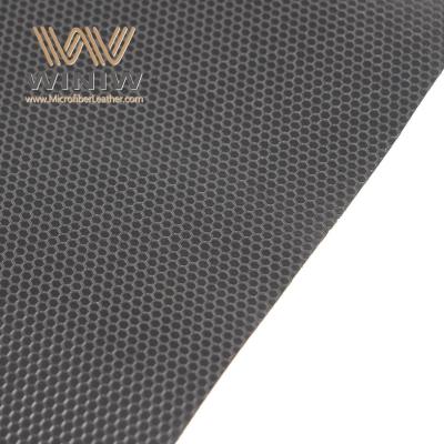 China Material de tejido de cuero de microfibra falsa para prendas de vestir en venta