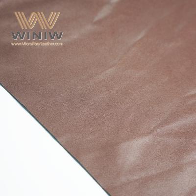 China Brown Color Micro Faux Leather Vegan Leather Fabric Garments Material for sale