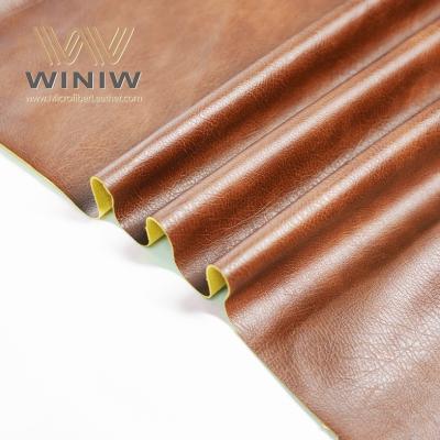 中国 Superior Quality Faux Microfiber Leather Fabric Vegan Material Garments Leather 販売のため