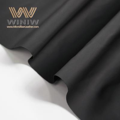 中国 0.7mm Thickness Black Micro Fiber Leather Fabric Material For Garments 販売のため