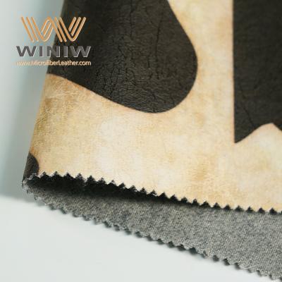 China 1.2mm White And Black Micro Vegan Leather Faux Synthetic Leather For Sofas à venda