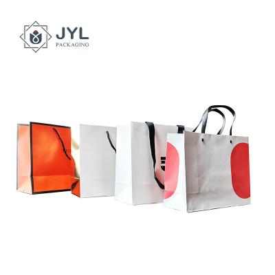 China Cardboard Shopping Cosmetic Paper Bag Ultralight ISO9001 Recycled Lightweight for sale