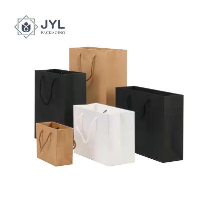 China Thicken Ribbon Handle Paper Bag , Moistureproof Packaging Bags For Cosmetics for sale