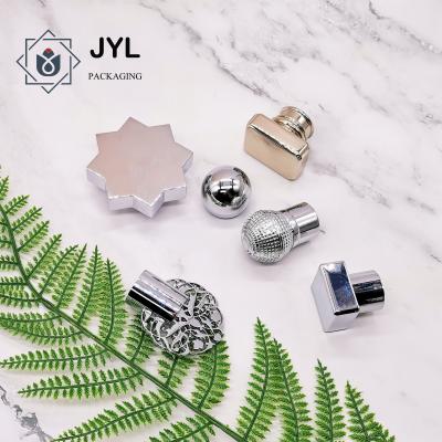 China Personalized Zinc Alloy Perfume Bottle Tops Manufacturer From China for sale