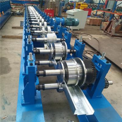 China Notch Punching Steel Door Frame Roll Forming Machine With 45 Degree Cut for sale