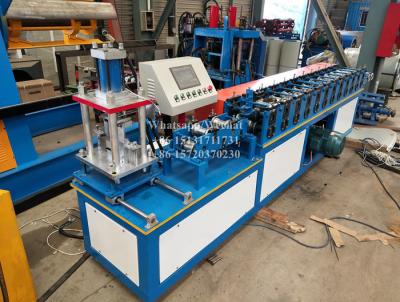 China Steel Aluminium Shutter Door Roll Forming Machine With Hydraulic Cutting Device for sale