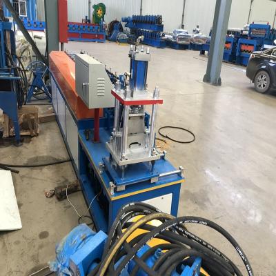 China 0.8mm Thickness Blue Shutter Door Forming Machine With Servo Feeding for sale