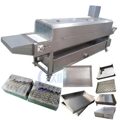 Cina Separate tray machine Fish and shrimp frozen tray isolated in seafood processing factory in vendita