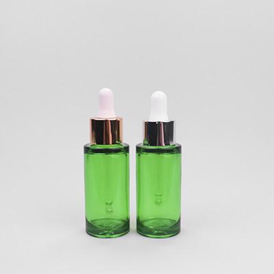 China Botellas de 30cc PETG de goteador verde de lujo con tapa de compresión en venta