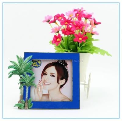 China Shinny Gifts Metal handmade cocoanut trees photo frame for home decoration for sale