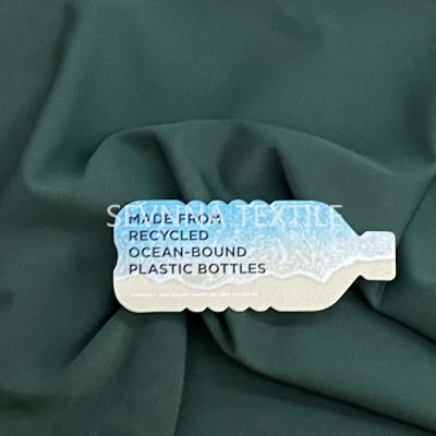 Chine L'Activewear de relief d'impression tricotent l'usage de recyclage élastique élevé de tissu à vendre