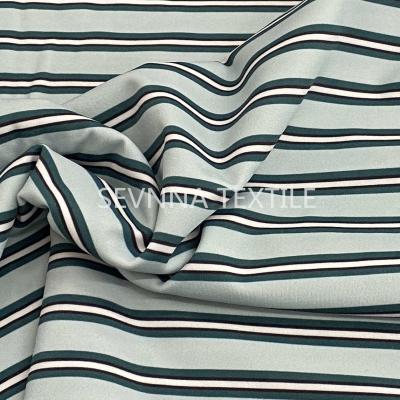 China Spandex 200GSM Activewear Knit Fabric Uv Function Ladies Swimwear for sale