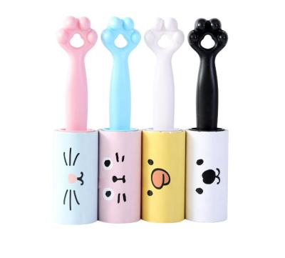 China Cat Design Handle 60 Layers Sticky Disposable Paper Tearing Lint Roller for sale