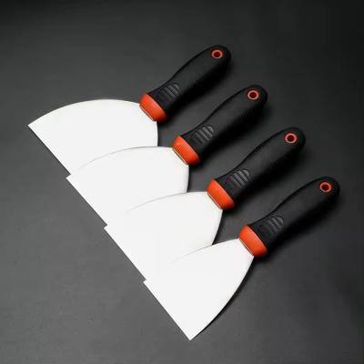 China High Quality Toughness Plastic Hand Tools Painting Wall Cleaning Putty Knife Stainless Steel Scraper en venta