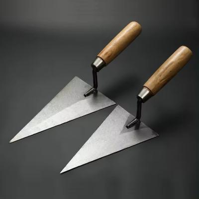 China Wood Handle Pointing Trowel Carbon Steel Wooden Handle Bricklaying Trowel for sale