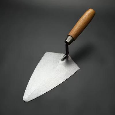 China Wooden Handle Margin Trowel Carbon Steel Point Masonry Trowel for sale
