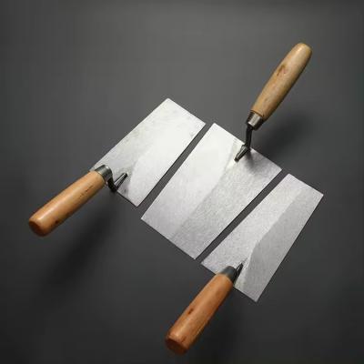 China Wooden Handle High Carbon Steel Float Trowel Square End Bucket Hardened and Tempered Steel Bricklaying Trowel for sale
