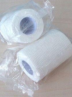 China Mano adhesiva elástico no tejida del vendaje de la luz EAB desgarrable en venta