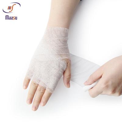 China Breathable Cotton Medical Elastic Bandage White Mesh Style for sale