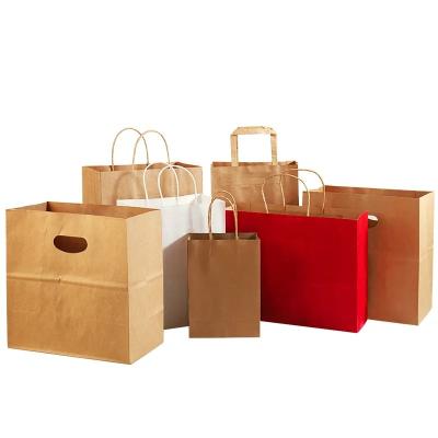 China 100% Eco-Friendly Recyclable Reinforced Handle Small Gift Craft Paper Bag With Your Own Logo for sale