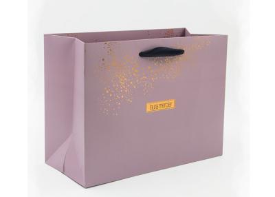 China Personalised gold hot stamping boutique paper bags with black ribbon handles for sale