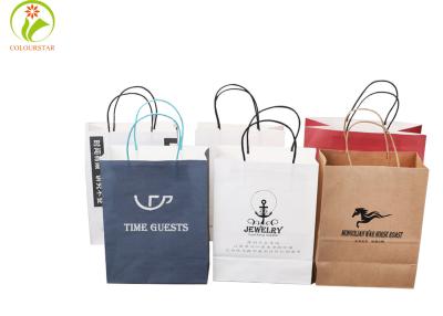 China Embossing CMYK 157gsm Kraft Paper Gift Bag FSC ODM With Handle for sale