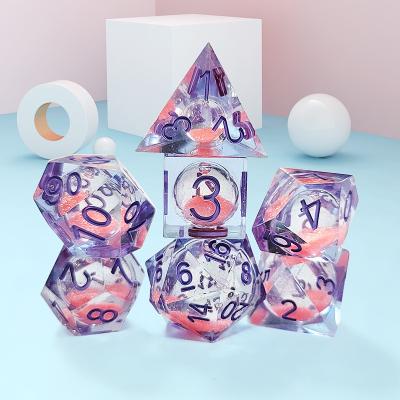 China Pink Liquid Flowing Sand Resin Polyhedral Dice Multi - Noodle Tablet Game Dice Set for sale