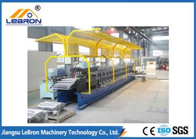 China 2018 new type PLC Control Full Automatic Shutter Door Guide Roll Forming Machine yellow color for sale