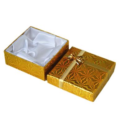 China Yellow Shining Fancy Paper Gift Box Silk Foam Filled Bowknot Jewelry Box With Ribbon for sale