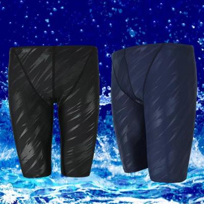 Chine Troncs de natation concurrentiels de mi jambe de troncs de natation de requin des hommes d'imitation de peau cinq points à vendre