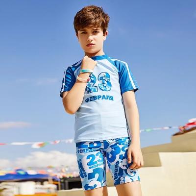 China Summer Big Boy Swimsuit Split Digital Printing Simple Children'S Swimsuit With Swimming Cap for sale