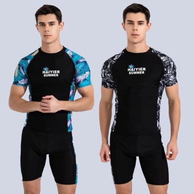 China Sports 2 Piece Mens Swimsuit Skin Friendly Printing Stitching Two Piece Swimsuit For Men for sale