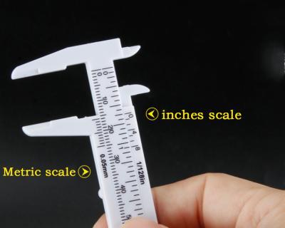 中国 0-80mmのプラスチック バーニヤ カリパスの眉毛永久的な構造のための測定用具のスライドのスケールの眉毛の形の定規 販売のため