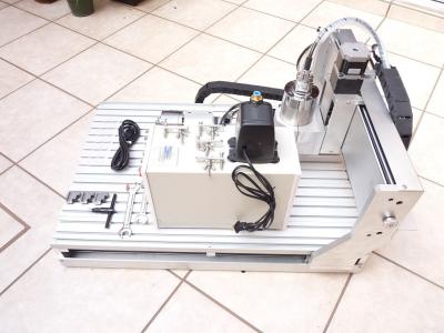 China Máquina de grabado de alta velocidad del router del CNC 3040 4 AXIS Mini Wood Router Machine en venta