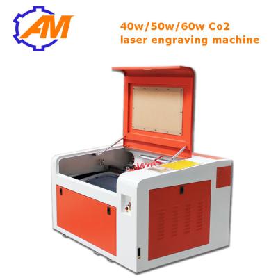 China CO2 Laser Engraving Cutting Machine 600*400mm Working Area Mini Laser Engraver for sale
