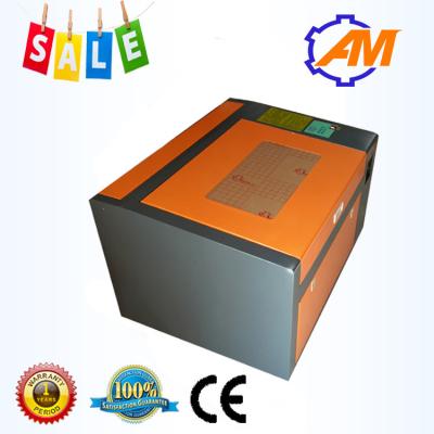 China CO2 Laser Engraving Cutting Machine AM6040 Mini Desktop 40W Engraver for sale
