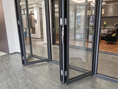 China Double Tempered Glass Black Aluminum Bifold Doors , Sliding Folding System Doors for sale