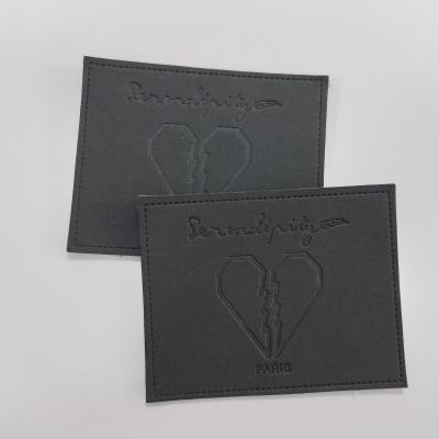 China Custom Embossed Leather Patches , PU Leather Labels Fashionable Design for sale
