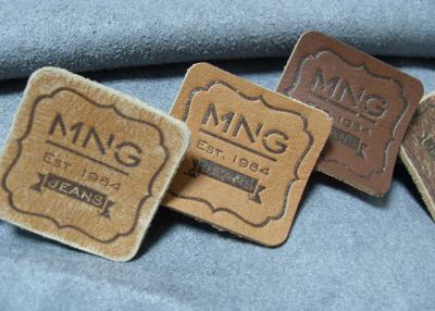 China Logo Embossed Real Leather Labels de encargo de alta calidad remienda para los vaqueros y los bolsos en venta