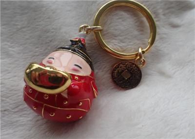 China Chinese Style Ceramic Fat Baby Gold Ingot Key Chain In Red Coat for sale