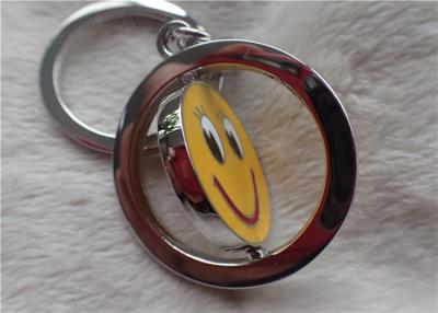 China Color Silver Key Chain Personalized Promotional Gifts With Rotatable Smiling Yellow Face for sale