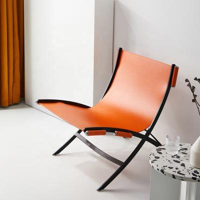 China Minimalist Leather Leisure Chairs Orange Saddle Leather Lounge Chair for sale