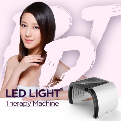 China Tragbare Lichttherapie-Gesichtsmaschine der Haut-Verjüngungs-Maschinen-7 der Farbepdt LED zu verkaufen