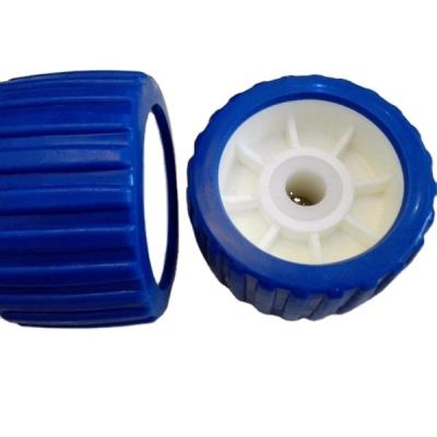 China Wobble Roller Boat Trailer Parts Blue Ribbed Roller With 30mm Bore for sale
