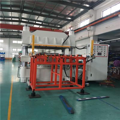 Cina Macchina di vulcanizzazione 1000 del piatto della macchina di Ton Inverted Hydraulic Hot Press in vendita