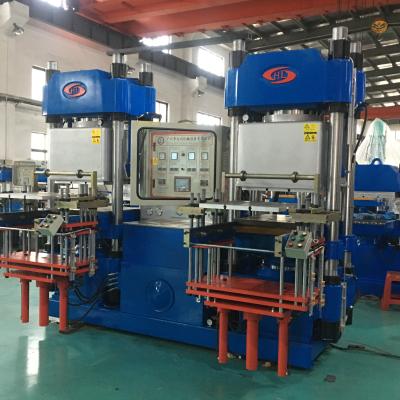 China Silicone Product Press Molding Machine/Muffin Cupcake Mold Making Machine/Vacuum Compression Molding Machine zu verkaufen