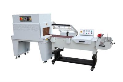 China POF PP Semi Automatic Shrink Wrapper L Shrink Wrap Tunnel Machine for sale