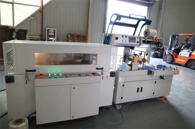 China Full Closed POF Hot Shrink Wrapping Machine Carton Heat Tunnel Conveyor for sale